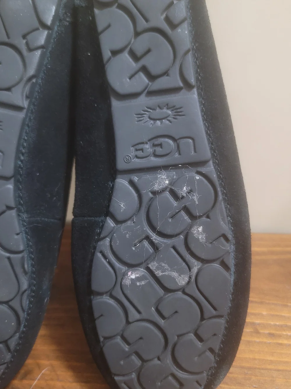 UGG  Black Suede Tassel Moccasin Slippers